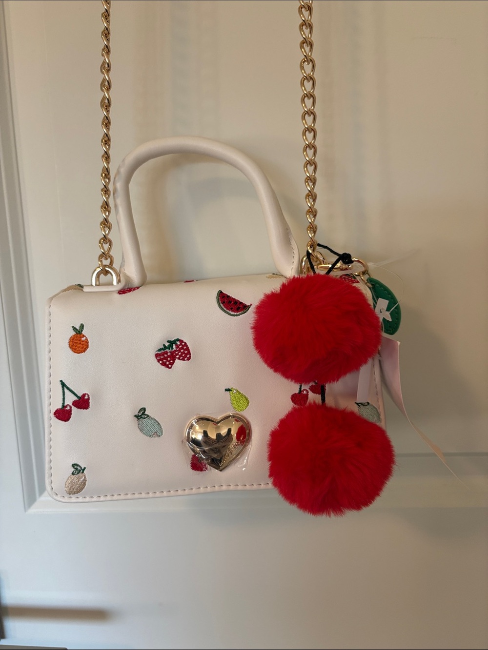 Betsey Johnson White Fruit Embroidered Mini Bag with Red Pom Pom Charm